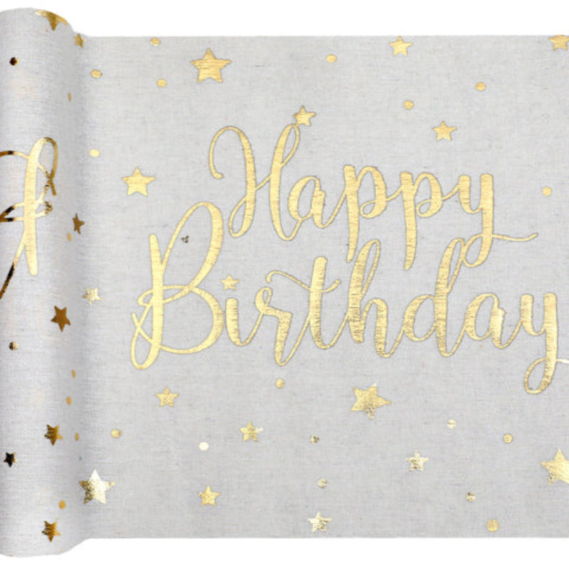 Gør fødselsdagsbordet ekstra festligt med en hvid bordløber i bomuld med Happy Birthday i guld. 3 meter lang og perfekt til enhver fejring!