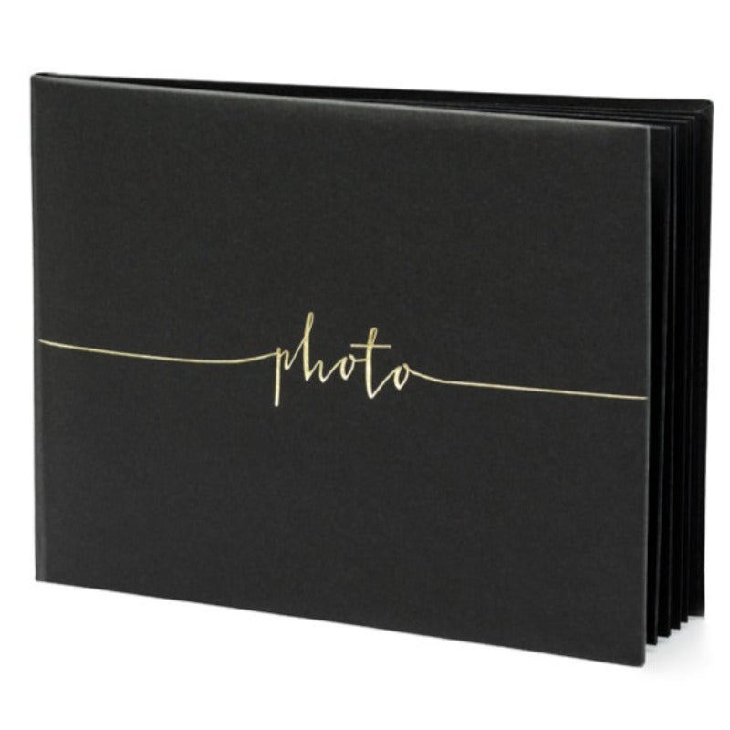 Sort fotoalbum med guldskrift