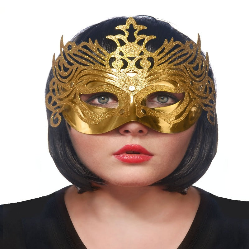 Fest maske med udskæringer i guld