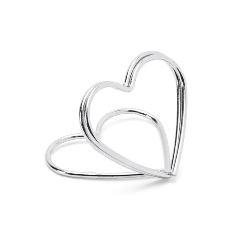 Bordkortholdere hjerter sølv 2,5 cm – pakke med 10 stk. elegante holdere til bordkort. Ideelle til bryllup, konfirmation, dåb og festlige borddækninger.