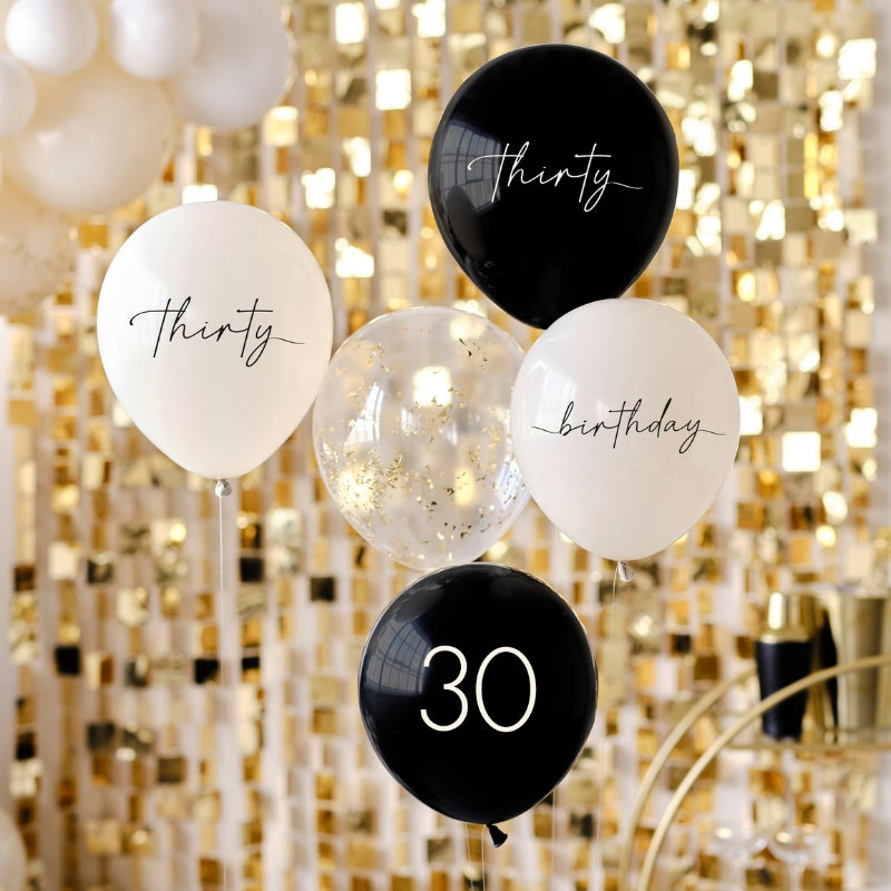 Elegant ballonpakke til 30-års fødselsdag i champagneguld, sort og nude – perfekt til en stilfuld fejring. Matcher Champagne Noir-kollektionen.