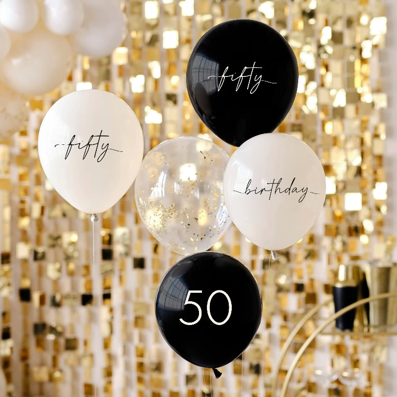 Elegant ballonpakke til 50-års fødselsdag i champagneguld, sort og nude – perfekt til en stilfuld fejring. Matcher Champagne Noir-kollektionen.